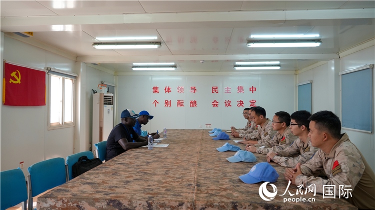 圖1 檢查組聽(tīng)取工作匯報(bào)。王軍杰攝